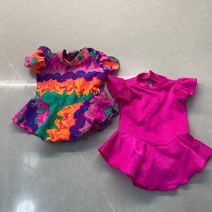 Two doll ice skating dresses